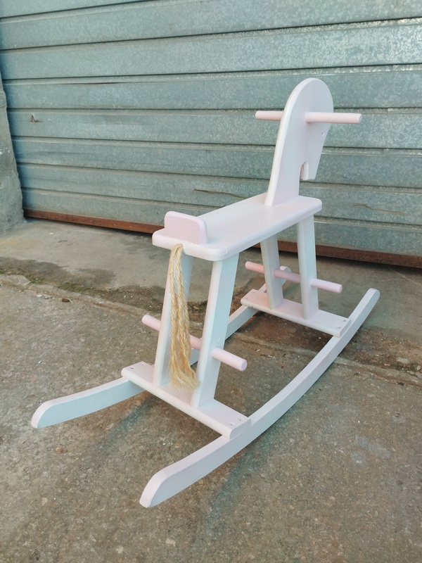 caballito balancin infantil madera rosa 35-56x80x26 1u